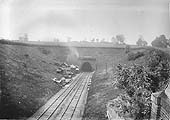 Kilsby Tunnel's north portal with contractor's huts having been erected on the up side of the route to London