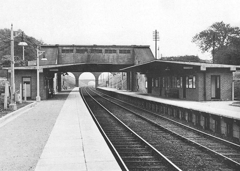 Looking along  Lea Hall's up platform towards Coventry showing the rear of the Booking Office which bridged both lines