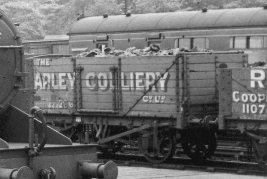 Close up of a fully loaded Arley Colliery coal wagon standing in the sidings ready to be transfered to the GWR at Leamington