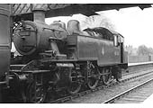British Railways built to an LMS design, Ivatt 2MT 2-6-2T No 41235 is seen standing at platform one prior to taking the train forward bunker first to Weeden