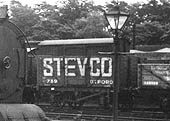 Close up showing a Private Owner wagon carrying the name 'STEVCO' of Oxford alongside what is thought to be a LMS four-plank wagon