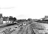 Looking towards Rugby with the ex-LNWR track now lifted whilst rubble from the station lies in between the platforms