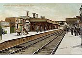 Edwardian view of Leamington Avenue station looking in the direction of Rugby as a train arrives from Rugby