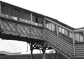 Another view of the footbridge showing the method of construction, the use of iron work, timber and glass