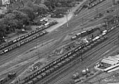 A 1937 aerial view of the former  LNWR station's sidings, its coal staithes and coal sidings with the exchange sidings below