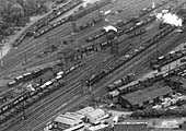 A 1937 aerial view of the former  LNWR station's coal staithes and coal sidings with the exchange sidings below
