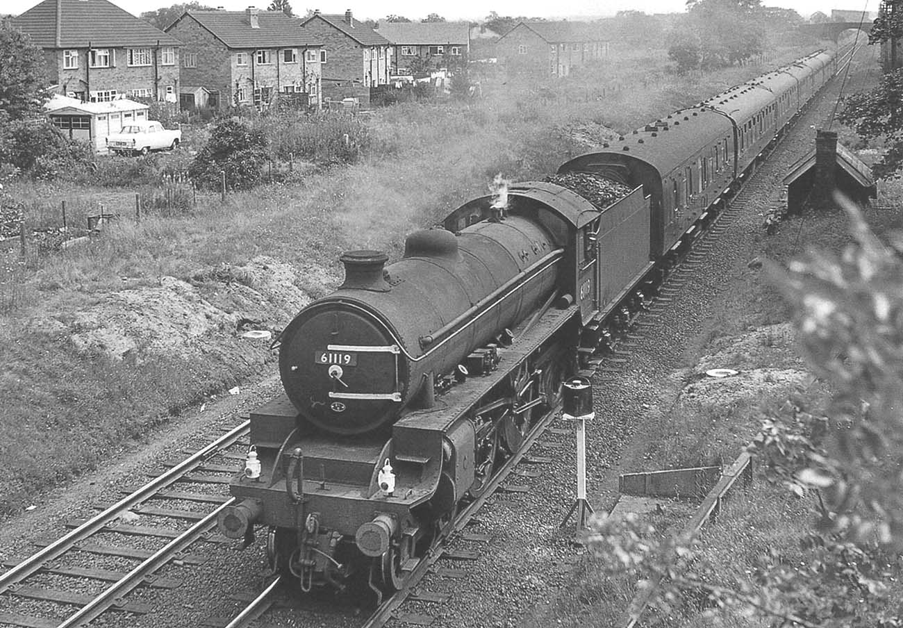 Ex-LNER 4-6-0 B1 class No 61119 is seen at the head of the 7 am Norwich Thorpe to Birmingham New Street service on 31st July 1963