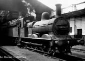 Ex-MR 0-6-0 2F No 58174 stands in steam outside Monument Lane shed on 24th July 1961