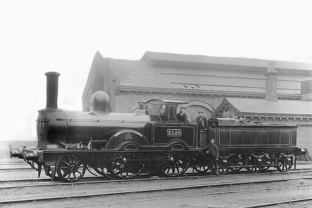 LNWR 2-4-0 Samson Class No 2158 'Serpent' stands alongside the entrance to Monument Lane's original shed