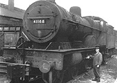 Ex-LMS 4-4-0 Compound No 41168 is seen being 'serviced' by driver Howard Stanley on 4th August 1960