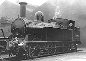 A very clean ex-LNWR 0-6-2T 'Coal Tank' locomotive No 58903 stands in front of Monument Lane Shed in 1954