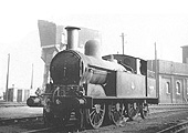 Ex-LNWR 2-4-2T 'Watford Tank' No 46900 is seen on one of the roads in front of Monument Lane shed