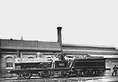 LNWR 2-2-2 'Large Bloomer' No 894 'Trentham' stands alongside the former coaling stage and original shed