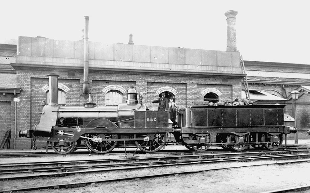 Another view of Trevithick 5ft 2-4-0 No 337 in its rebuilt form standing outside the water tank and coaling stage