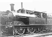 Ex-LNWR 0-6-2T '18 inch Passenger Tank' No 6876 stands cold outside the shed on 1st September 1935