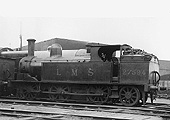 Ex-LNWR 2F Coal Tank 0-6-2T No 27594 is seen standing in front of the shed fully coaled and watered