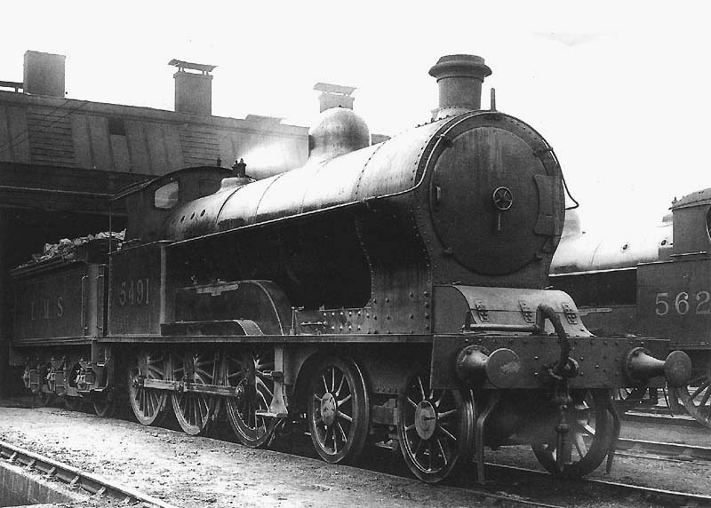 Ex-LNWR 2P 4-6-0 Experiment Class No 5491 'Prince George' stands outside Nuneaton shed on 24th October 1933