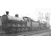 Ex-LNWR G2a 0-8-0 No 49120 stands in front of ex-LMS 'Horwich Crab' 2-6-0 No 42781 ready to depart the shed