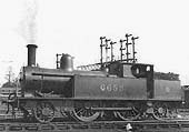 Ex-LNWR 1P 2-4-2T No 6655 is seen raising steam on one of the roads in front of Nuneaton shed in March 1933