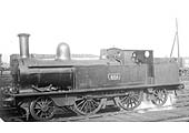 LNWR 5ft 6in 2-4-2T No 465 is seen in steam standing in front of Nuneaton shed in 1922