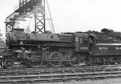 Ex-LMS 4MT 2-6-0 No 43019, fitted with Capprotti valve gear, is seen on shed standing alongside the Rugby to Stafford mainline
