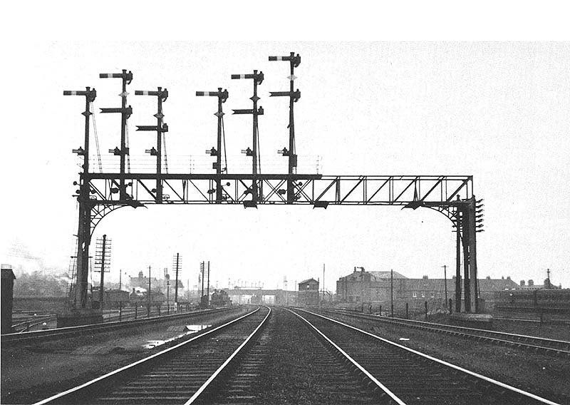 Looking towards Nuneaton station with the shed yard on the left, in the centre Nuneaton No 1 Signal Box and on the right the carriage sidings
