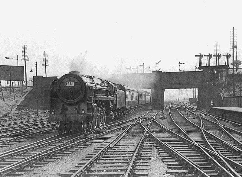British Railways Standard Class 7MT 4-6-2 No 70016 'Ariel' passes through Bromford Bridge whilst at the head of a special to Crewe