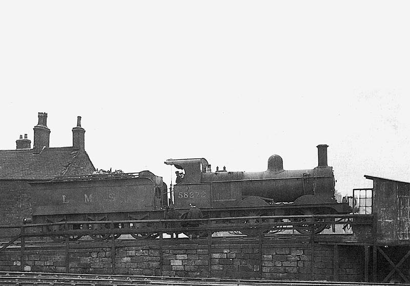 Ex-MR 2F 0-6-0 No 58272 is seen paused between jobs on Nuneaton's up hump siding circa 1951