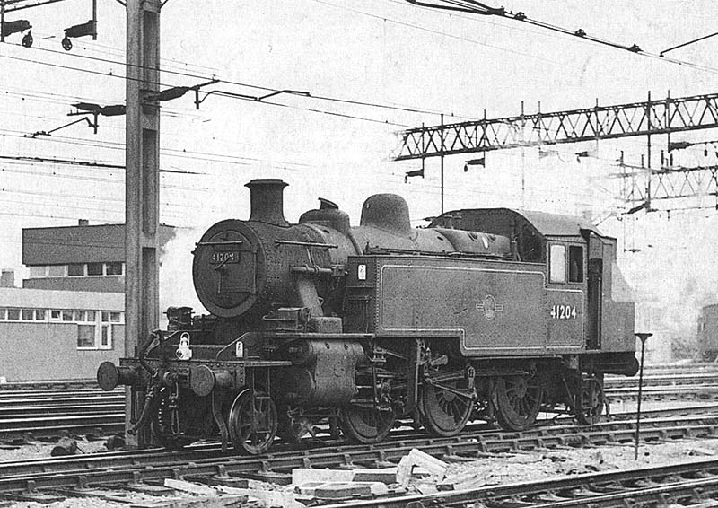 Ex-LMS 2MT 2-6-2T No 41204 pauses between trips opposite Nuneaton Power Signal Box on 21st May 1964
