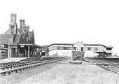 Looking towards Tamworth showing the post-1909 configuration of the layout of Polesworth station with the signal box in the centre