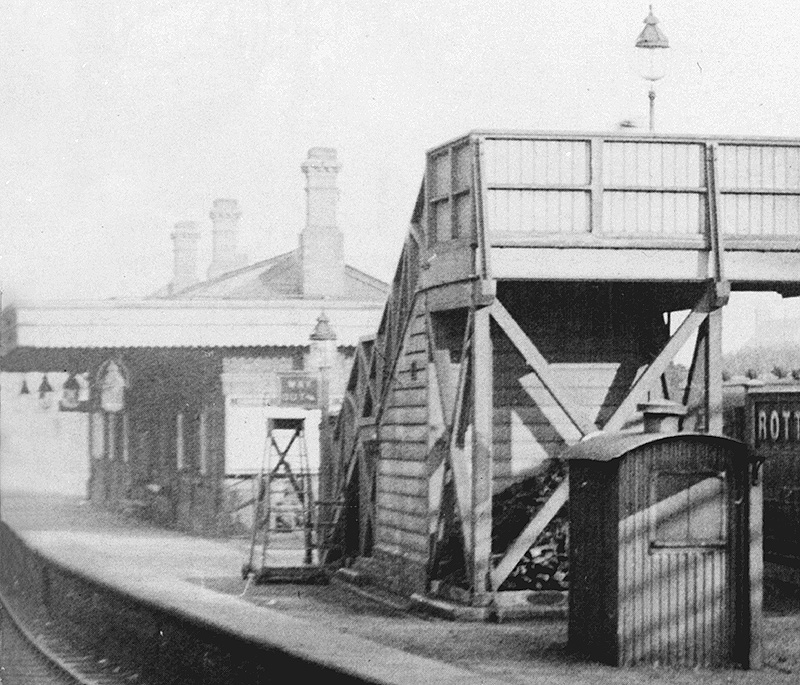 Close up showing details of Rotton Park Road station's footbridge, platform and the passenger building