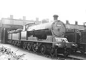 Ex-LNWR 'Experimental Goods' 4-6-0 No 8820 stands fully coaled at the front of one of Rugby's shed