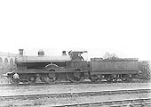 Ex-LNWR Renown class 4-4-0 No 5117 'Polyphemus' stands next to coal stacks after turning on the turntable