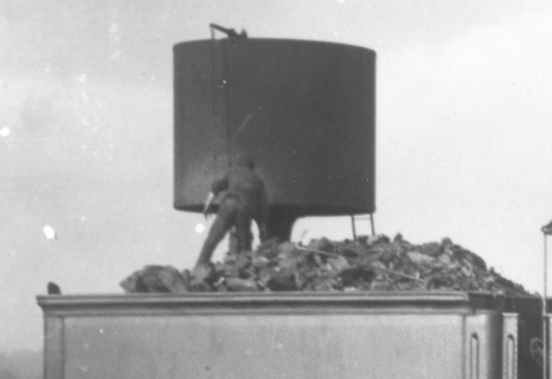 rugby-shed-close-up-showing-the-fireman-controlling-the-flow-of-water