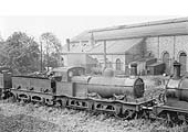 Ex-MR 1F '480 class' Standard Goods 0-6-0 No 22567 stands in line with other stored locomotives by the Engine Repair Shop