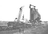 Ex-LMS 4-6-0 'Blsck 5' No 45237 is seen being rerailed by Rugby's breakdown crane after colliding with ex-LMS 2-6-4T No 42541 in 1962