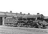 Ex-LMS 5MT 4-6-0 No 45000 is seen standing 'cold' outside of one of Rugby's shed on 15th March 1953