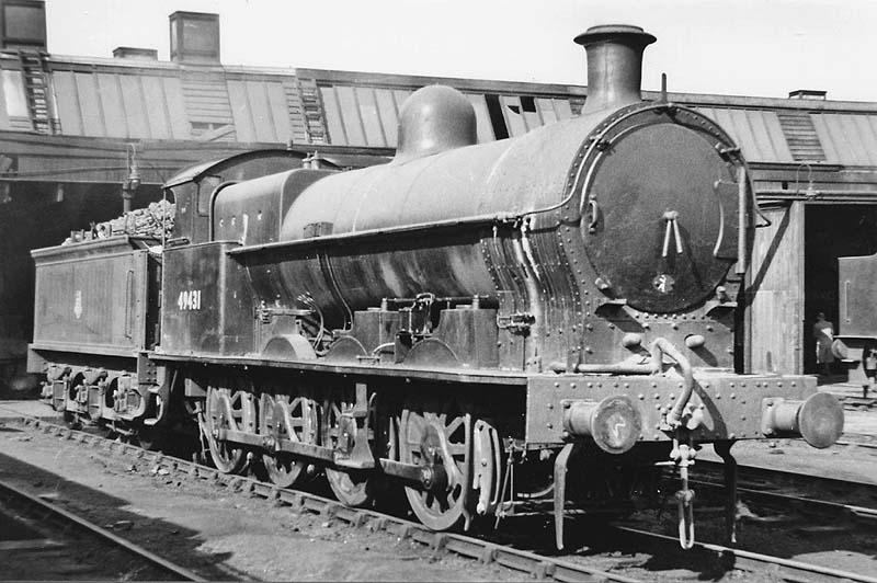 Ex-LNWR G2 0-8-0 No 49431 stands outside Rugby shed coaled and watered ready for its next day's working seen on 15th March 1953