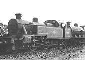 Ex-LMS 3P 2-6-2T No 400051 is seen stored between the Erecting Workshop and coal stacks in Spring 1959