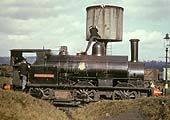 Ex-LNWR 0-6-0ST Special Tank Engine, only bearing the nameplate 'Carr Depot Wol', is seen taking water at Rugby