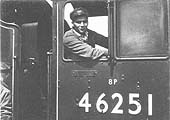 Close up of 'Eric' the fireman who is seen on the footplate of Coronation Class No 46251 'City of Nottingham'