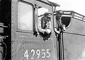 Close up showing Frank Dring, the driver, with his fireman George Porter on the footplate of No 42955