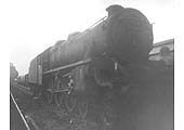 Ex-LMS 5MT 4-6-0 No 45037, a visitor to the shed, stands 'cold' in front of Rugby shed in late 1964