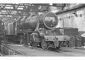 A clean ex-LMS 2-8-0 8F No 48526 carrying its home '2A' Rugby shed plate is seen reposed inside of Rugby's new shed