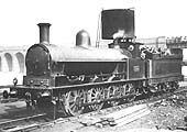 LNWR Class C 0-8-0 No 1803 is seen wearing the plain black wartime livery whilst the tender is black and lined