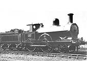 LNWR 2-4-0 'Big Jumbo' No 1531 'Cromwell' stands outside in the shed's yard