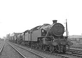 British Railways built Fairburn 4MT 2-6-4T No 42069 stands at the head of a line of withdrawn locomotives next to No 1 shed