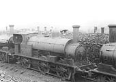 Ex-LNWR 0-6-0ST No 7267 stands in line with two stored 0-6-0 goods engines on 14th February 1932