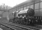 In ex-works condition LMS 4-6-0 Royal Scot class No 6115 'Scots Guardsman' stands outside the trainshed ready to take forward a down express
