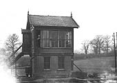 View of Newbold's small two-storey signal cabin equipped with a LNWR tumbler frame of 15 levers